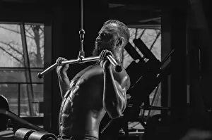 Athletic Training Prints: Professional athlete performs an exercise in the gym
