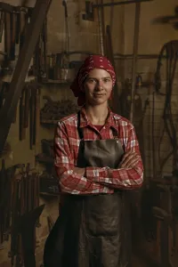 Blacksmith Workshop Prints: Professional blacksmith in workshop portrait