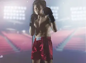 Male Athlete Prints: Professional boxer stands in the ring