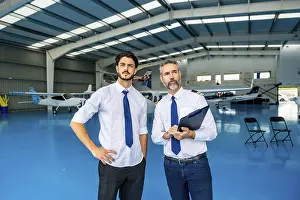 Aviation Industry Professionals Prints: Two professional pilots, an instructor and a student