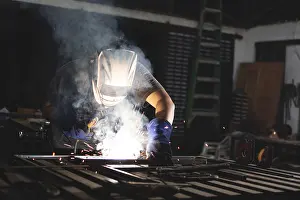 Professional Welder Prints: Professional welder working at the workbench