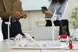 Modern Architecture Design Prints: Two professionals engage in a collaborative meeting