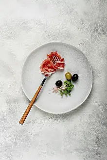 Italian Delicacy Prints: Prosciutto on a fork, top view