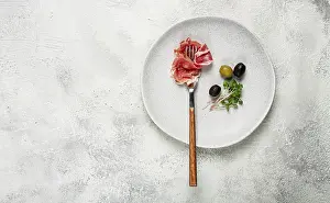 Italian Delicacy Prints: Prosciutto on a fork, top view