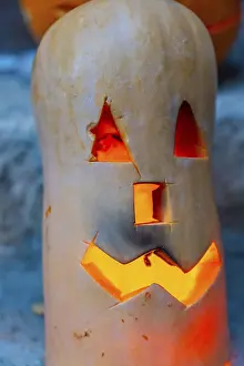 Halloween Decoration Prints: A pumpkin with a carved face and a light inside