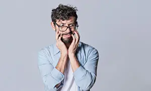 Isolated Background Photo Prints: Puzzled man on isolated background