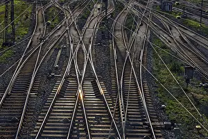 Steel Building Construction Prints: Many railroad tracks with interchanges and electric cables seeing in perspective