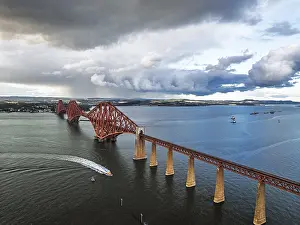 Forth Bridge Scotland Prints: Rain clouds over Forth Bridge from a drone