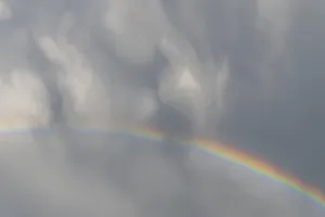 Prismatic Colors In The Sky Prints: Rainbow appears in rain clouds in spring