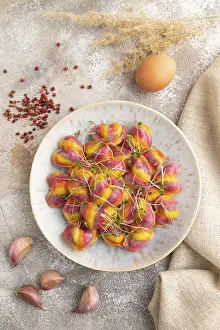 High Angle Food Shots Prints: Rainbow colored dumplings with pepper