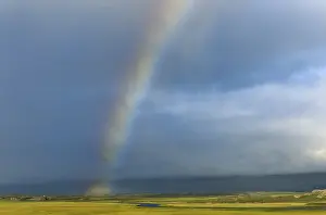 Cloudy Sky With Rainbow Prints: Rainbow above the Selfjot River