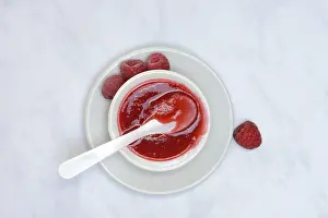 Red Fruit Bowl Prints: Raspberry sauce, raspberry jam in bowl with spoon