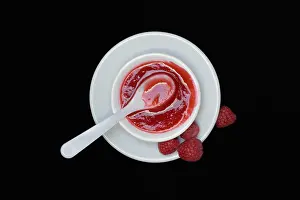 Raspberries Nutrition Prints: Raspberry sauce, raspberry jam in bowl with spoon