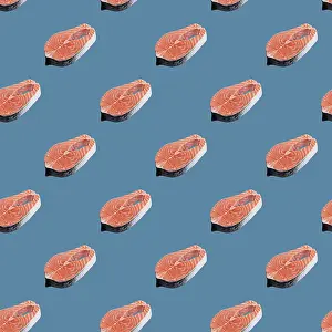 Blue Background Image Prints: Raw salmon steak pattern on a blue background