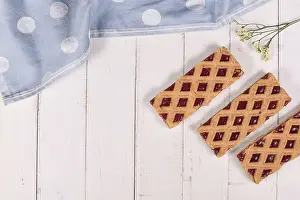 European Bakery Goods Prints: Rectangular slices of pie called Linzer Torte