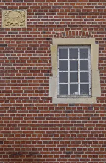 Coat Of Arms Germany Prints: A rectangular window and a coat of arms in a red brick facade
