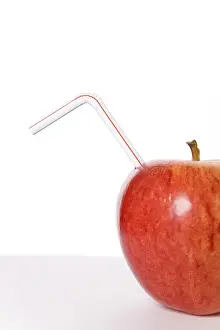 Red Apple Photography Prints: Red apple with a straw