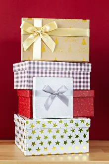 Advent Season Gifts Prints: A red background with batch of Christmas gift boxes