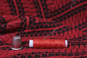 Images Dated 11th August 2024: Red and Black Fabric Print Close Up
