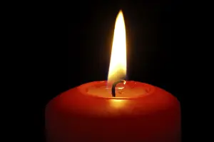 Nocturnal Night View Photo Prints: Red candle burning