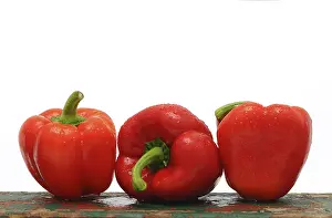 Red Capsicums Prints: Three red capsicums