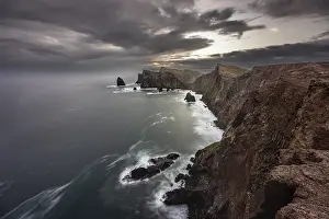Ponta De Sao Lourenco Prints: Red cliffs and rocks in the sea