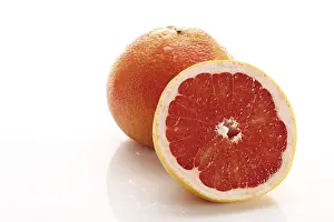Close Up Citrus Fruit Prints: Red grapefruit, Ruby Star, one whole and one half