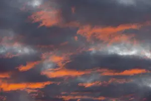 Atmospheric Evening Light Photos Prints: Red illuminated clouds after a sunset