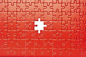 Missing Jigsaw Piece Prints: A red jigsaw puzzle with one missing piece