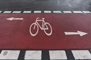 Middle Europe Empty Streets Prints: Red marked cycle path on a district road