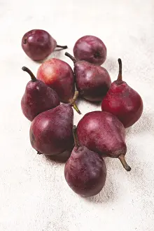 Colorful Fruit Prints: Red pears scattered on the table