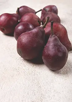 Selective Focus Images Prints: Red pears scattered on the table