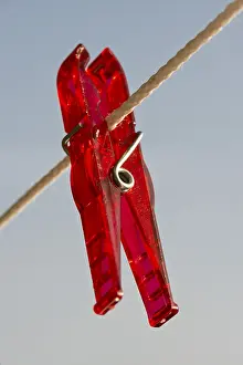 Empty Room Studio Photography Prints: Red peg on a clothesline