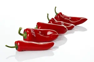 Red Pointed Peppers Prints: Five red Pointed peppers (Capsicum)