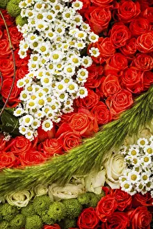 Red Coloured Blossoms In Nature Prints: Red roses and chamomiles as pattern for wedding design