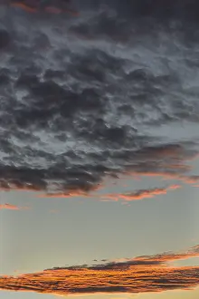 Red Clouds Germany Prints: Red shining clouds in the evening sky