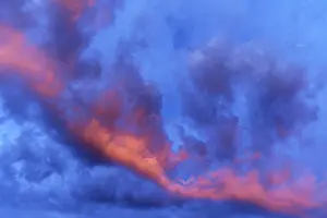 Gloomy Evening Atmosphere Prints: Reddish clouds in the evening sky