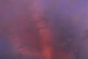 Central Europe Cloudy Skies Prints: Reddish clouds in the evening sky