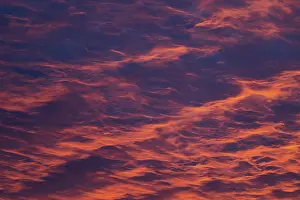 Red Sky Dawn Prints: Reddish orange cloud structures, dawn