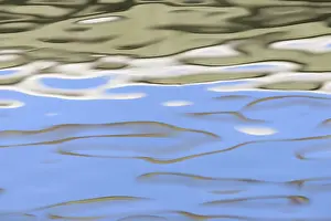 Cloudy Sky Reflection Prints: Reflection of cloudy sky on the wavy water surface