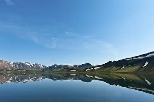 Panoramic Mountain Landscape Prints: Reflection in the still lake, remnants of snow