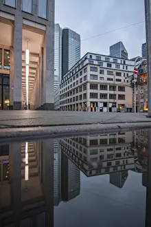City Reflection Photography Prints: Reflection in a puddle between skyscrapers