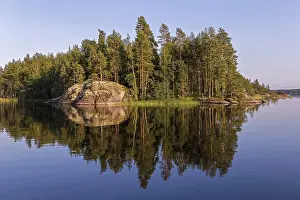 Scandinavian Nature Scenes Prints: Reflection Trees and rocks, lake