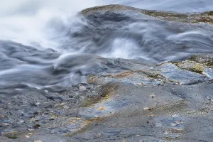 October In Lapland Sweden Prints: Reflections on a rock at a rushing stream