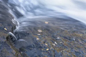 Lapland Landscape Photography Prints: Reflections on a rock at a rushing stream