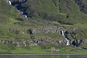 Icelandic Countryside Waterfalls Prints: Remote farm in front of a waterfall