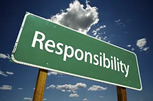 Cloudy Dramatic Sky Image Prints: Responsibility road sign with dramatic clouds and sky