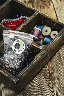 Handicraft Sewing Tools Prints: Retro composition with buttons and thread in wooden box