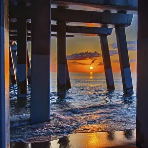 Outer Banks North Carolina Prints: The rising sun peeks through clouds