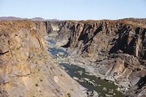 Deserted River Course Prints: River bed and dump on the Orange River